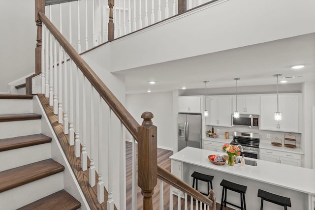 104 Turner Ashby Dr Unit 127, Bridgewater, VA 22812 - stairs with wood finished floors and recessed lighting