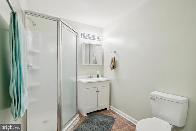  - full bathroom featuring vanity, a stall shower, and tile patterned floors