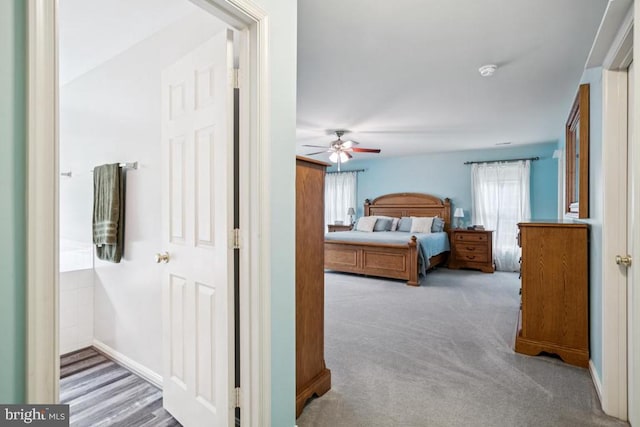  - bedroom with multiple windows, carpet flooring, and ceiling fan