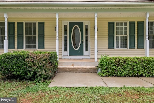  - view of exterior entry with a porch