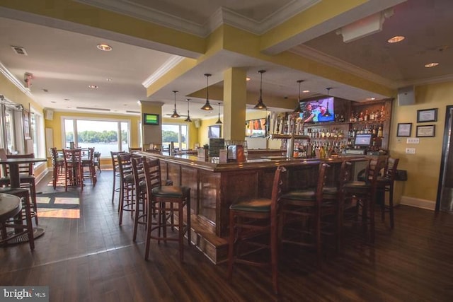 200 Saylers Creek Rd, Locust Grove, VA 22508 - indoor dry bar featuring dark wood-style floors, crown molding, pendant lighting, and baseboards