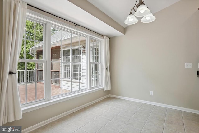 200 Saylers Creek Rd, Locust Grove, VA 22508 - unfurnished dining area featuring light tile patterned floors, healthy amount of natural light, baseboards, and a chandelier