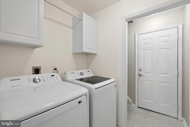 200 Saylers Creek Rd, Locust Grove, VA 22508 - clothes washing area featuring cabinet space, separate washer and dryer, baseboards, and light tile patterned floors