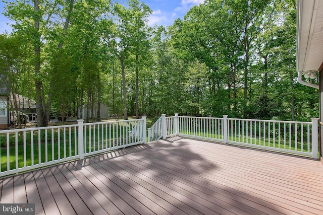 200 Saylers Creek Rd, Locust Grove, VA 22508 - wooden deck with a storage unit and an outbuilding