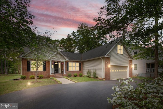 200 Saylers Creek Rd, Locust Grove, VA 22508 - view of front of house with driveway, brick siding, and a front lawn