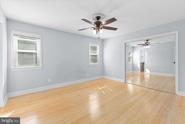 12218 Corter Ave, Fredericksburg, VA 22407 - unfurnished bedroom with light wood-style floors and a ceiling fan