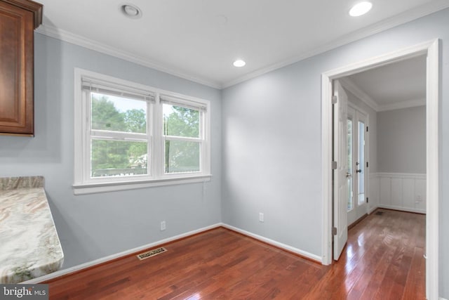 12218 Corter Ave, Fredericksburg, VA 22407 - unfurnished dining area with wood finished floors, ornamental molding, and recessed lighting