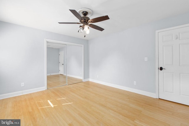 12218 Corter Ave, Fredericksburg, VA 22407 - unfurnished bedroom featuring wood finished floors, a closet, and a ceiling fan