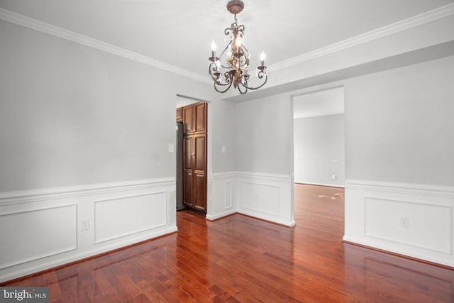 12218 Corter Ave, Fredericksburg, VA 22407 - spare room with a chandelier, wood finished floors, ornamental molding, and a wainscoted wall