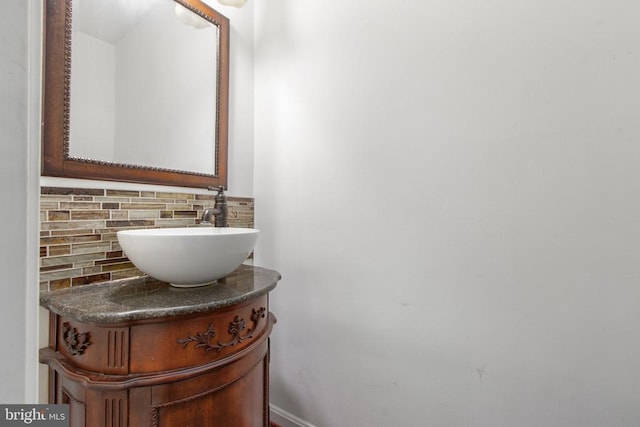 12218 Corter Ave, Fredericksburg, VA 22407 - bathroom featuring vanity and backsplash