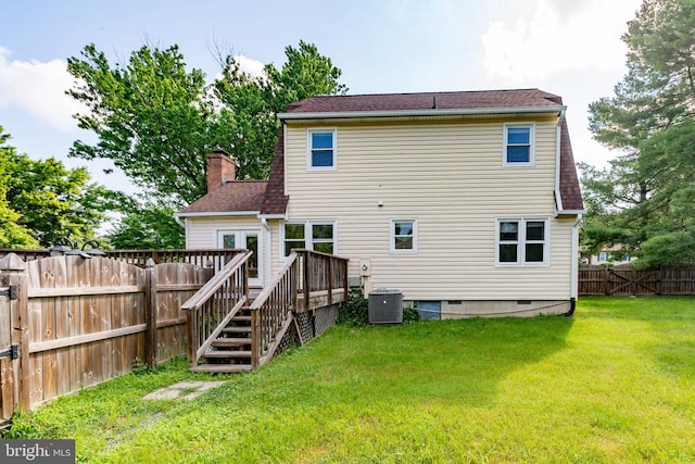 12218 Corter Ave, Fredericksburg, VA 22407 - back of house with a fenced backyard, a deck, a chimney, crawl space, and stairway