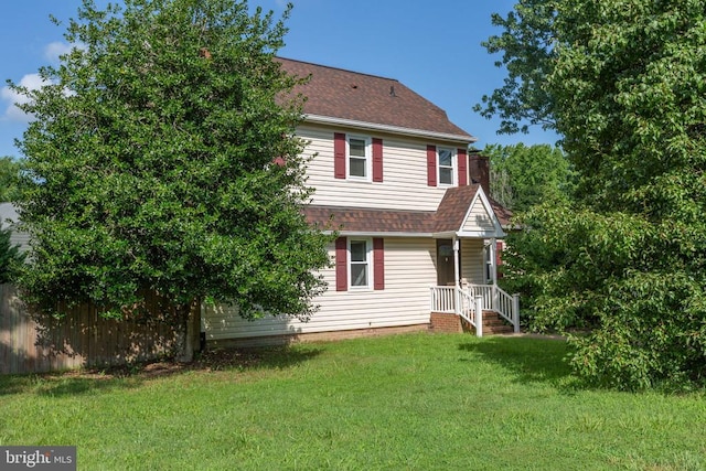 12218 Corter Ave, Fredericksburg, VA 22407 - rear view of house with a yard and roof with shingles