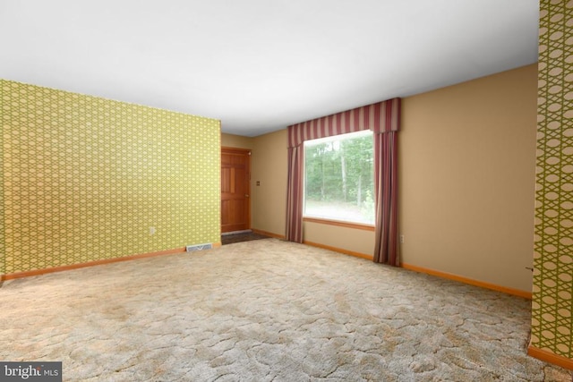 8305 Old Plank Rd, Fredericksburg, VA 22407 - carpeted spare room with baseboards and wallpapered walls