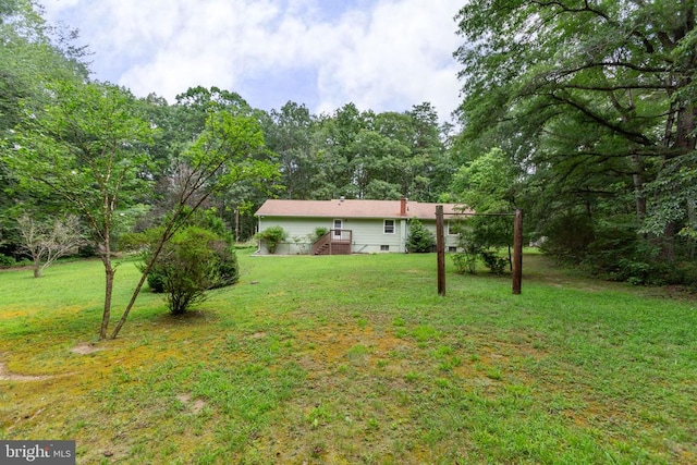 8305 Old Plank Rd, Fredericksburg, VA 22407 - view of green lawn with a wooded view