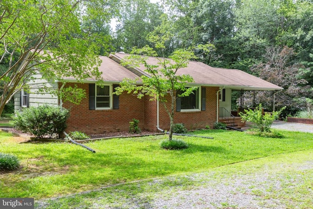 8305 Old Plank Rd, Fredericksburg, VA 22407 - ranch-style house with brick siding and a front lawn