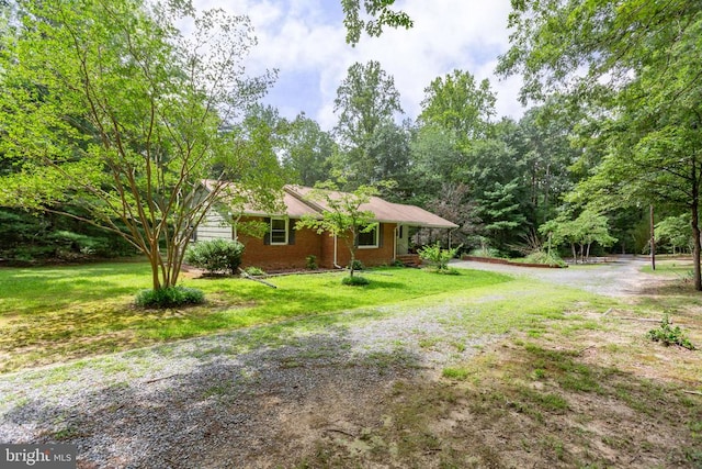 8305 Old Plank Rd, Fredericksburg, VA 22407 - single story home featuring brick siding and a front yard