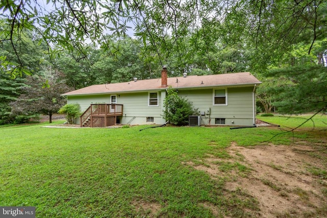 8305 Old Plank Rd, Fredericksburg, VA 22407 - rear view of house with a wooden deck, stairs, a lawn, and a chimney