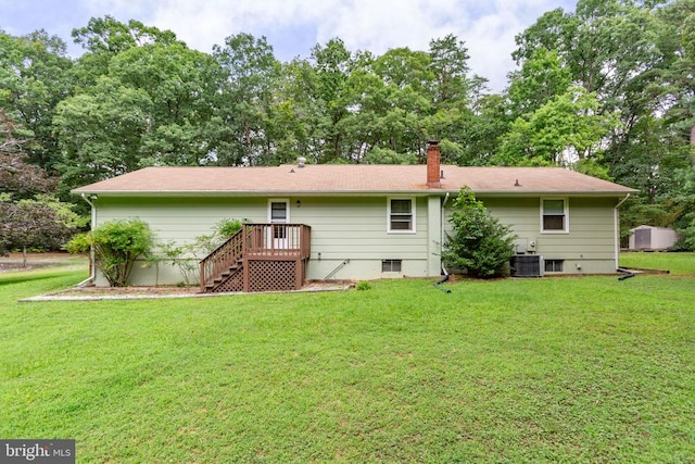 8305 Old Plank Rd, Fredericksburg, VA 22407 - rear view of house featuring a lawn and a chimney