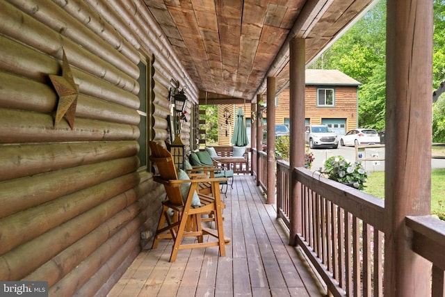 wooden terrace with covered porch