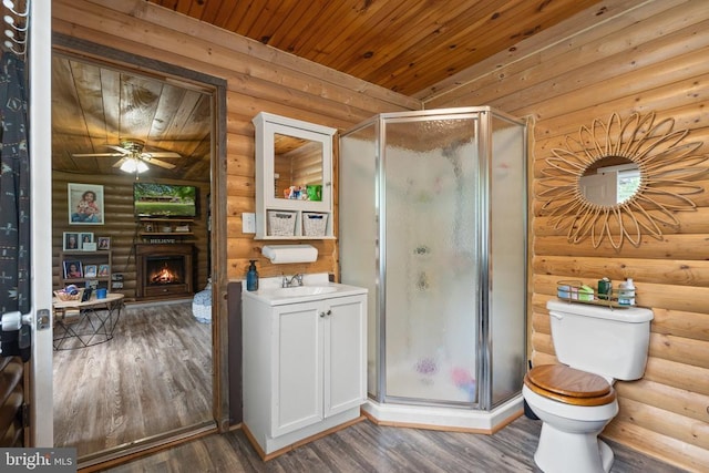 bathroom with log walls, wood finished floors, wood ceiling, a stall shower, and toilet