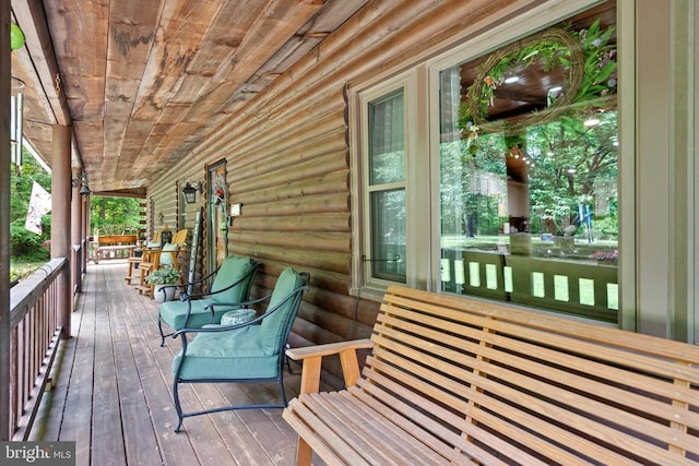 deck with covered porch