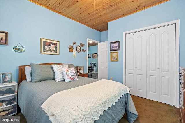bedroom with dark carpet, a closet, wooden ceiling, and ornamental molding