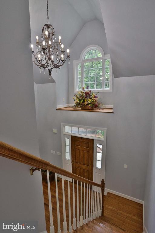 13608 General Slocum Ct S, Fredericksburg, VA 22407 - foyer with wood finished floors, vaulted ceiling, and a chandelier