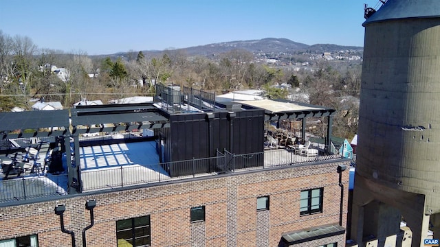exterior space featuring a mountain view