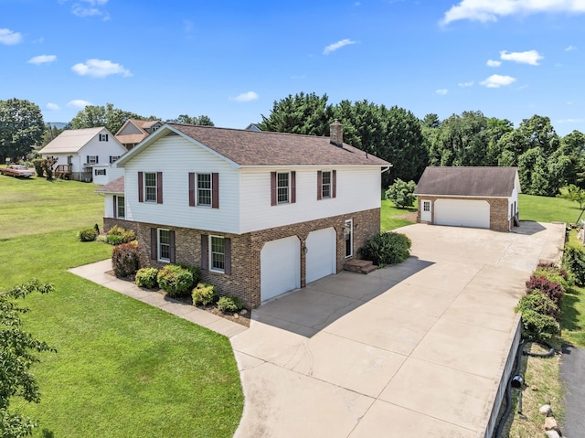 336 Hollingsworth Rd, Woodstock, VA 22664 - view of front of property with brick siding, an outbuilding, a front lawn, and a chimney