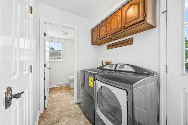 336 Hollingsworth Rd, Woodstock, VA 22664 - laundry area with washing machine and dryer and cabinet space