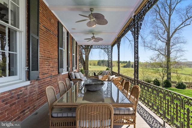 exterior space with ceiling fan and outdoor dining area