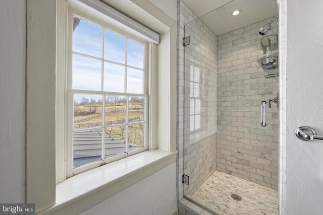 bathroom with a stall shower