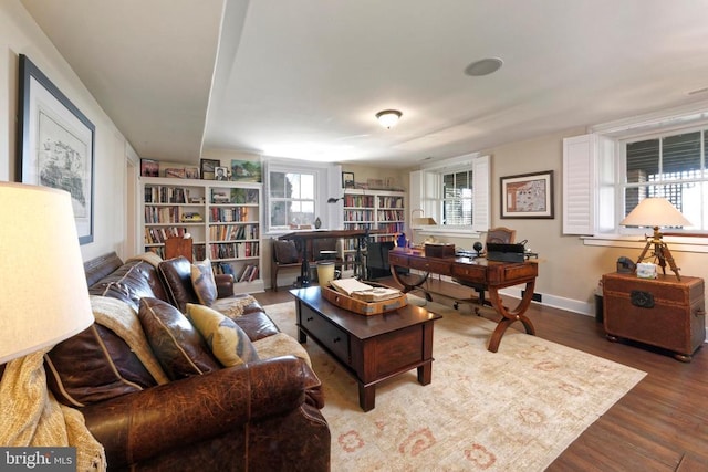 office space featuring wood finished floors and baseboards