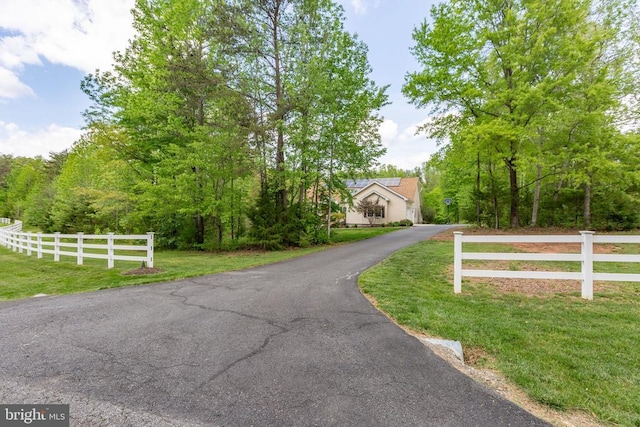 view of street featuring driveway