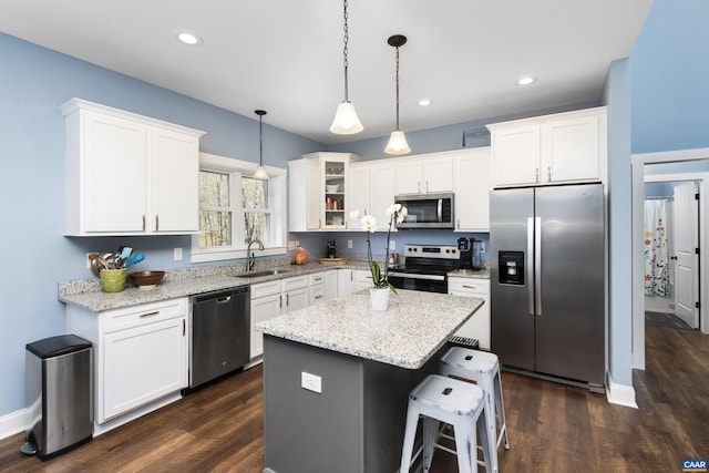 68 Ben Lyons Ln, Lyndhurst, VA 22952 - kitchen featuring appliances with stainless steel finishes, a sink, dark wood-style flooring, white cabinets, and recessed lighting
