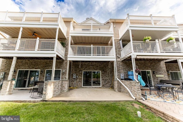288 Lake Front Dr, Mineral, VA 23117 - rear view of property with a balcony, a patio, and stone siding