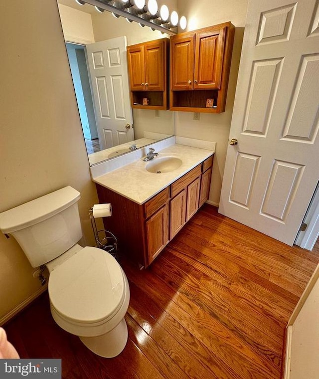 288 Lake Front Dr, Mineral, VA 23117 - bathroom featuring toilet, wood finished floors, and vanity