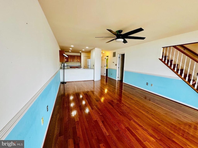 288 Lake Front Dr, Mineral, VA 23117 - unfurnished living room featuring wood finished floors, ceiling fan, recessed lighting, and stairs