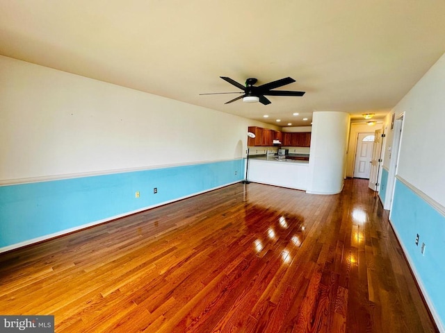 288 Lake Front Dr, Mineral, VA 23117 - unfurnished living room featuring wood finished floors, a ceiling fan, and baseboards