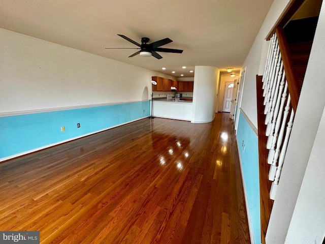 288 Lake Front Dr, Mineral, VA 23117 - unfurnished living room featuring dark wood-style flooring, ceiling fan, stairs, and recessed lighting