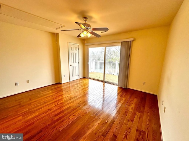288 Lake Front Dr, Mineral, VA 23117 - unfurnished room featuring a ceiling fan, attic access, wood finished floors, and baseboards