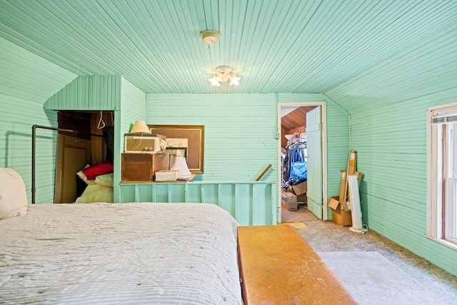 6596 Mayberry Rd, Singers Glen, VA 22850 - bedroom with lofted ceiling, a spacious closet, carpet floors, wood ceiling, and wooden walls