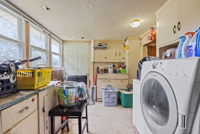 6596 Mayberry Rd, Singers Glen, VA 22850 - laundry room with washer / dryer, cabinet space, a textured ceiling, and light flooring