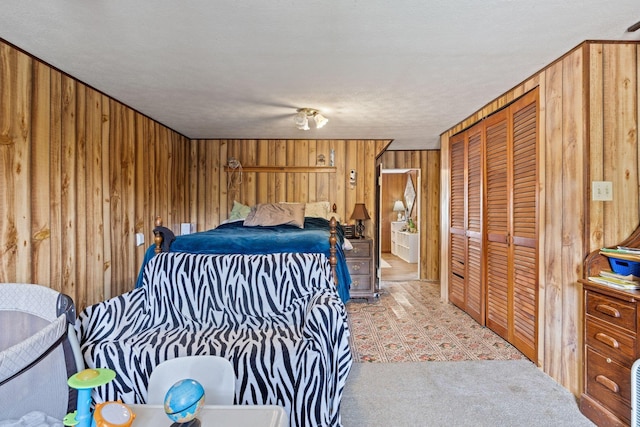 6596 Mayberry Rd, Singers Glen, VA 22850 - bedroom featuring wooden walls, a closet, and a textured ceiling