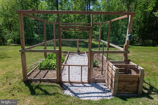  - view of playground with a garden and a yard
