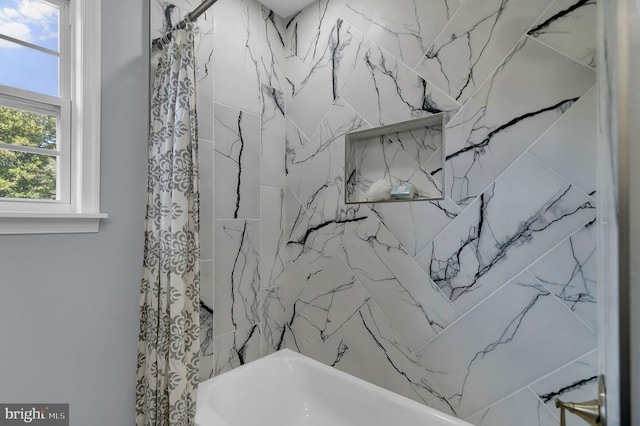  - full bath with shower / tub combo with curtain