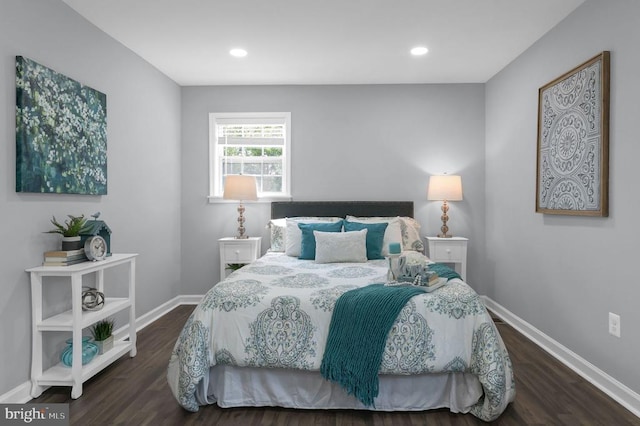  - bedroom with wood finished floors and recessed lighting