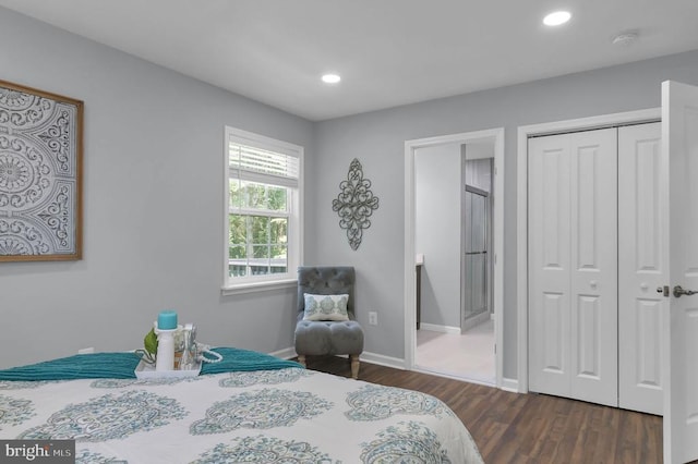  - bedroom featuring dark wood-style floors, recessed lighting, and a closet