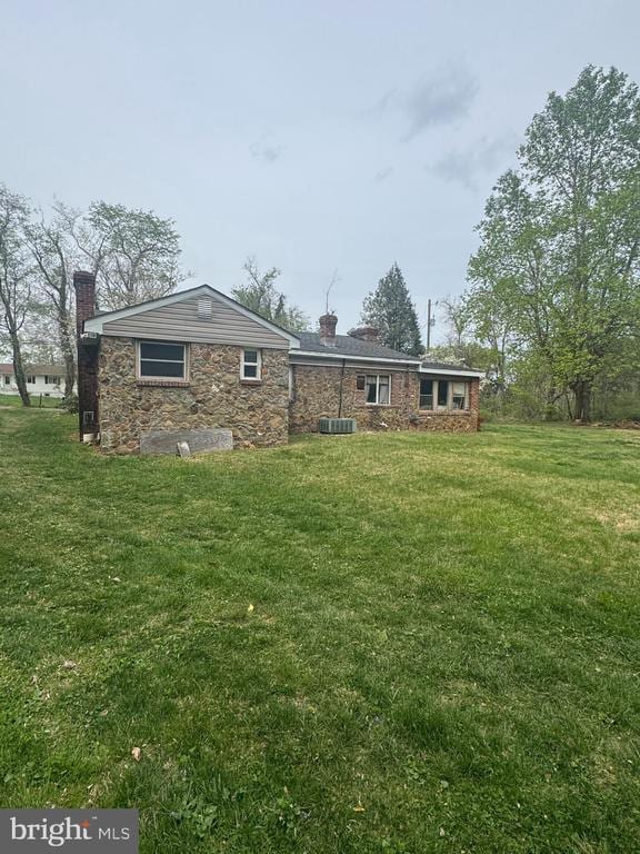 11418 Cox Ml, Gordonsville, VA 22942 - rear view of property with a chimney, a yard, and stone siding