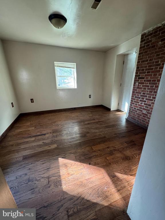 11418 Cox Ml, Gordonsville, VA 22942 - spare room featuring wood finished floors and baseboards